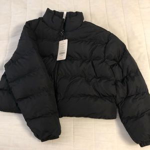 Black puffer jacket. New with tags